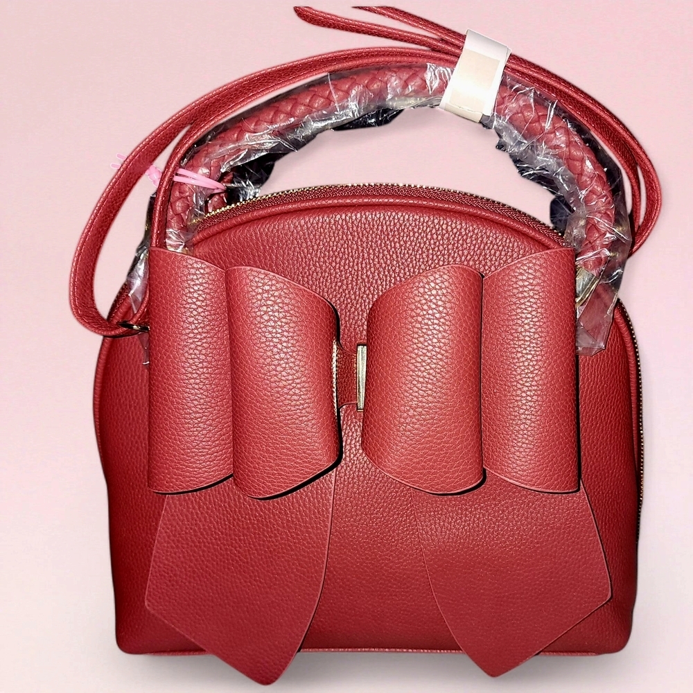 LIKE DREAMS BEA BRAIDED BOW VEGAN TOP HANDLE CROSSBODY BAG